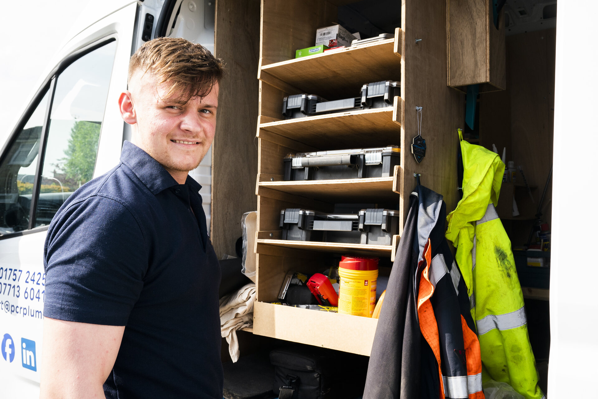Emergency plumber and home repair service covering Cawood, Selby, YO8 and YO19 PCR Plumbers engineer beside a fully equipped service van, ready for an emergency plumbing repair near Selby