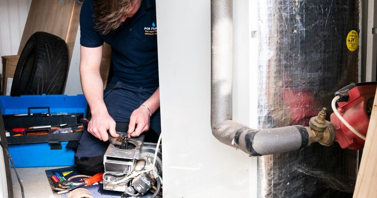 Oil boiler servicing Yorkshire. An Oftec registered engineer from PCR Plumbers servicing an oil boiler in YO8