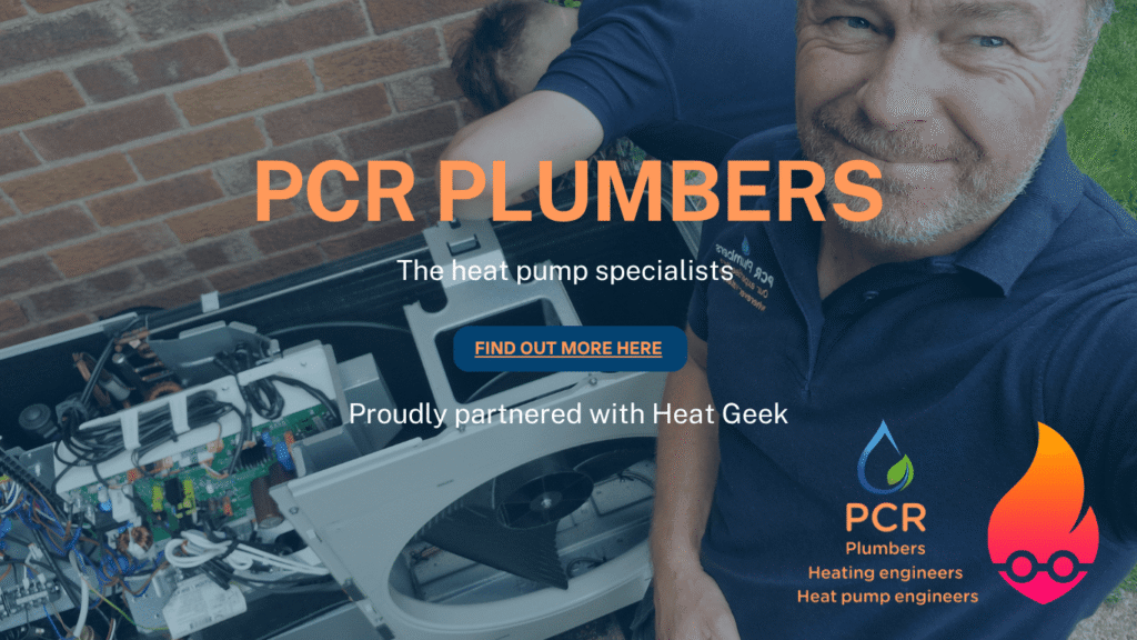 Two Heat Geek Heat Pump engineers servicing the company's Heat Geek Heat Pump installation from the previous year, performing maintenance in a residential setting.