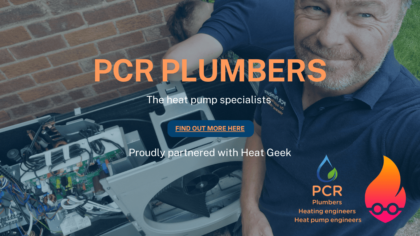 Two Heat Geek Heat Pump engineers servicing the company's Heat Geek Heat Pump installation from the previous year, performing maintenance in a residential setting.
